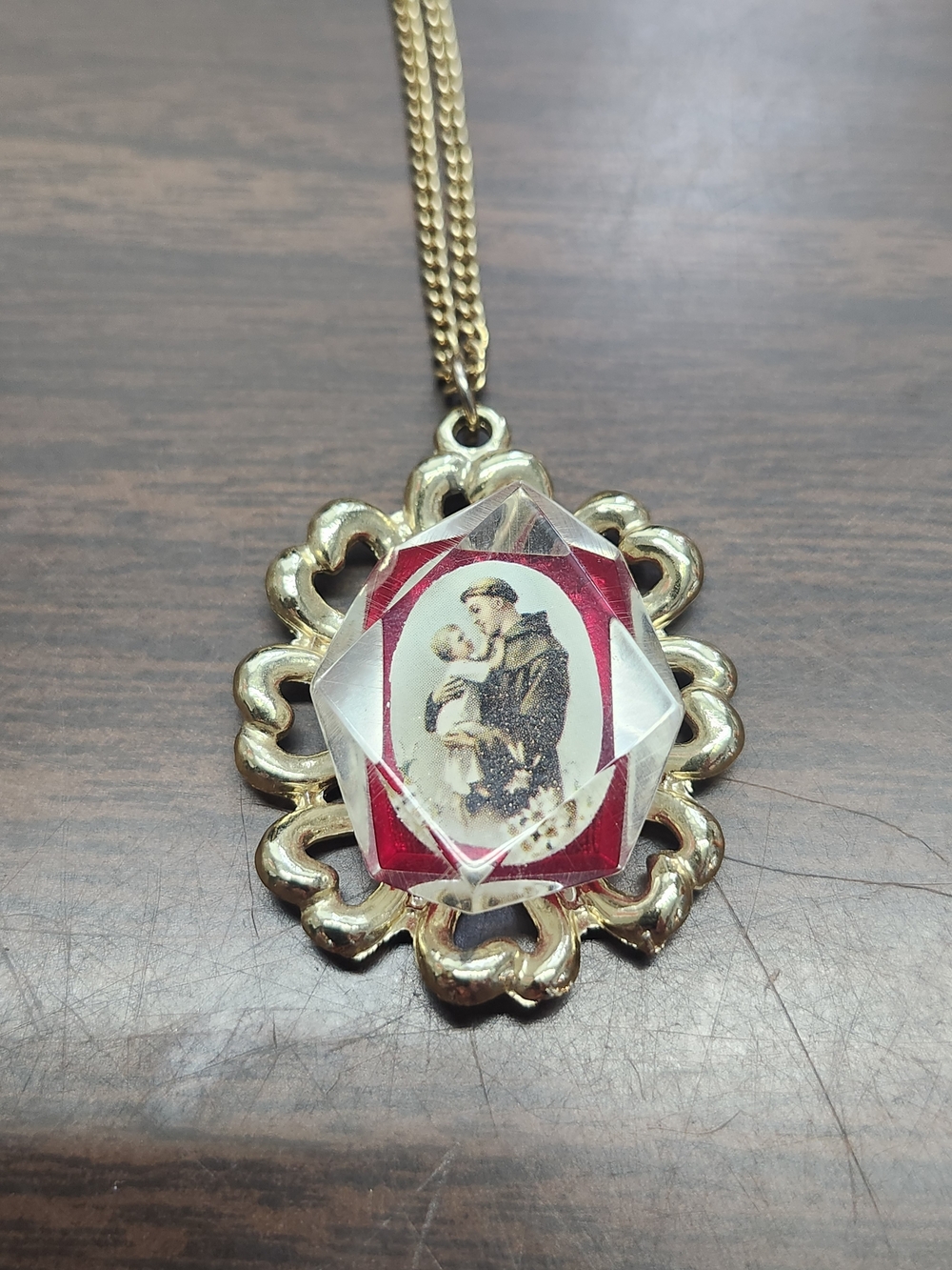 Gold-Tone Red Medallion Pendant Necklace with Religious Motif 17"
